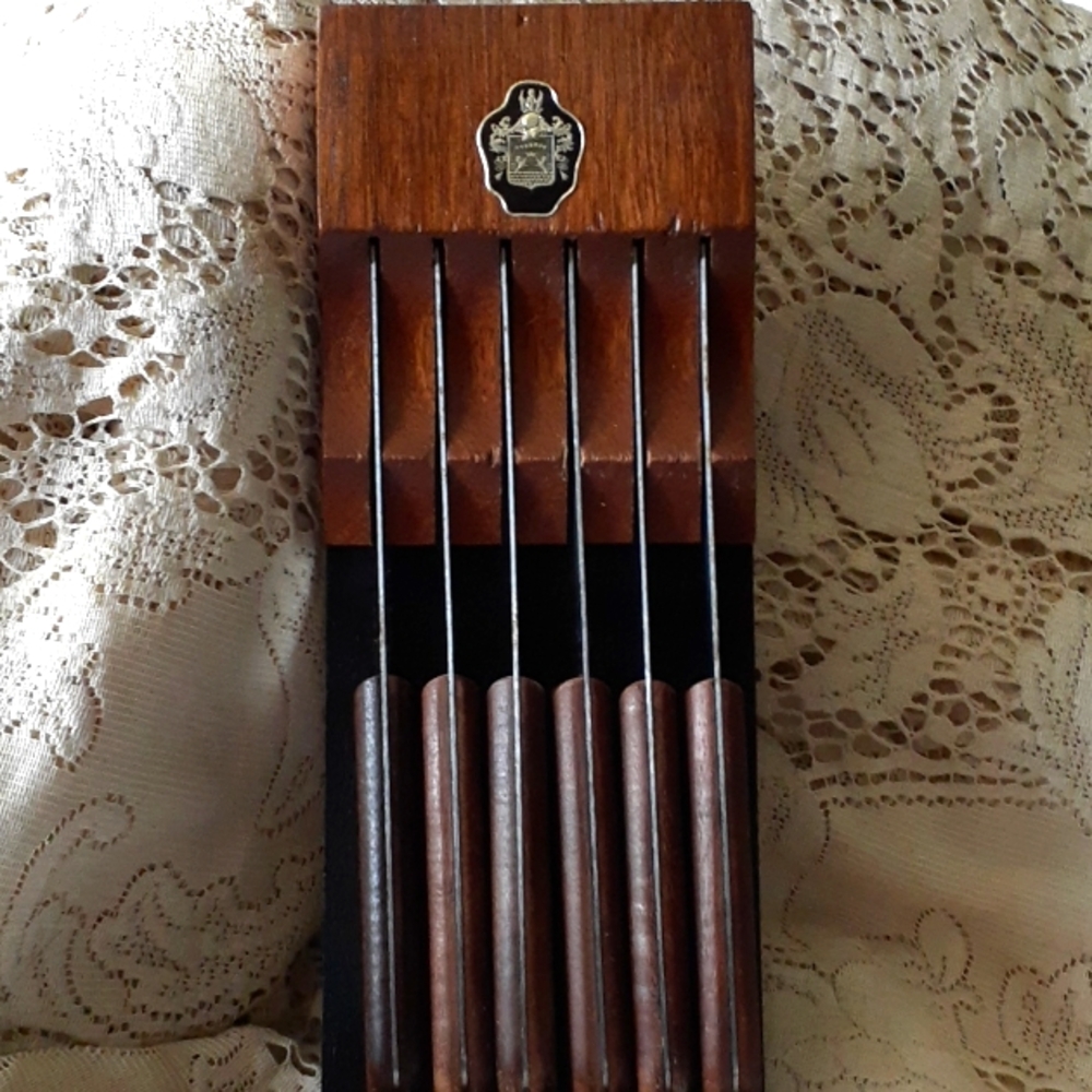 Vintage tramontina set of 6 steak knives, made in Brazil.